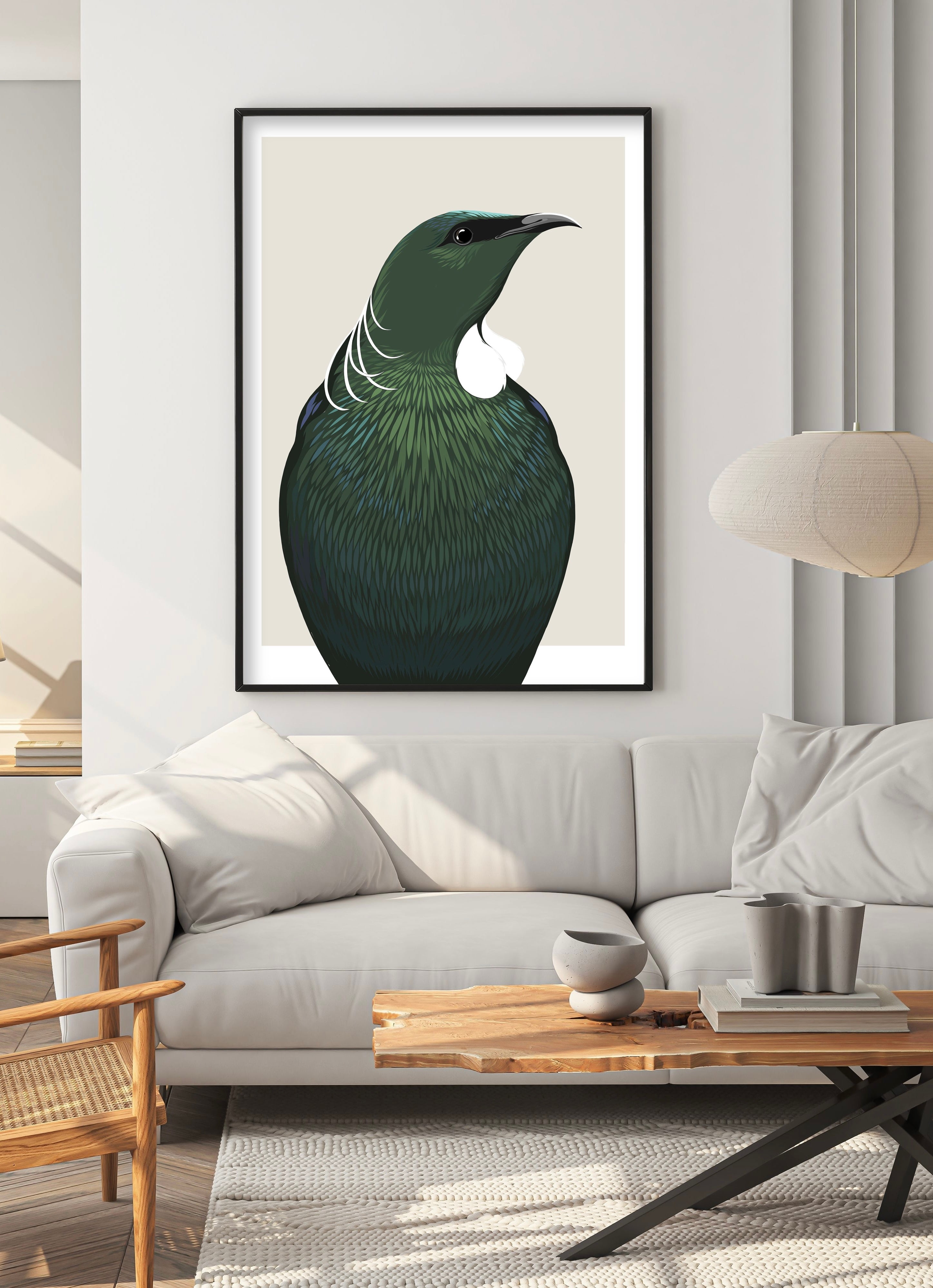 Black framed Tui art print by NZ artist Hansby Design, styled in the living room